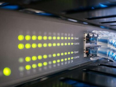 A POPP Managed Ethernet Switch distributes internet bandwidth to computers and IP Phones on a Cloud PBX in an Edina, MN business