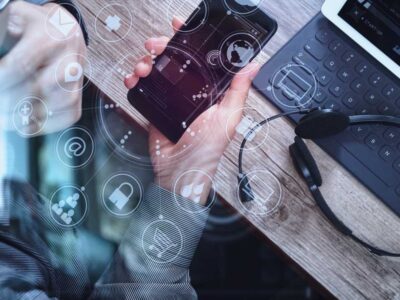 A business professional uses a business VoIP solution in Minneapolis, MN