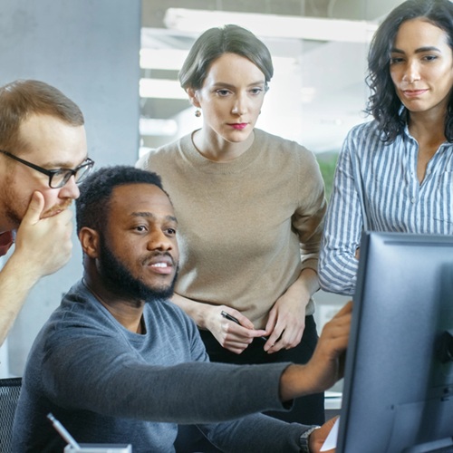 Office Team of Diverse Young Creative People Work on a Problem Solution